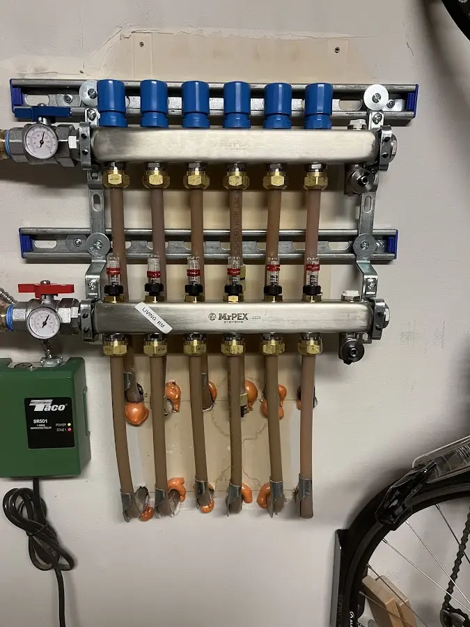 Plumber performing Gas Line Installation at a residential property in Antigo